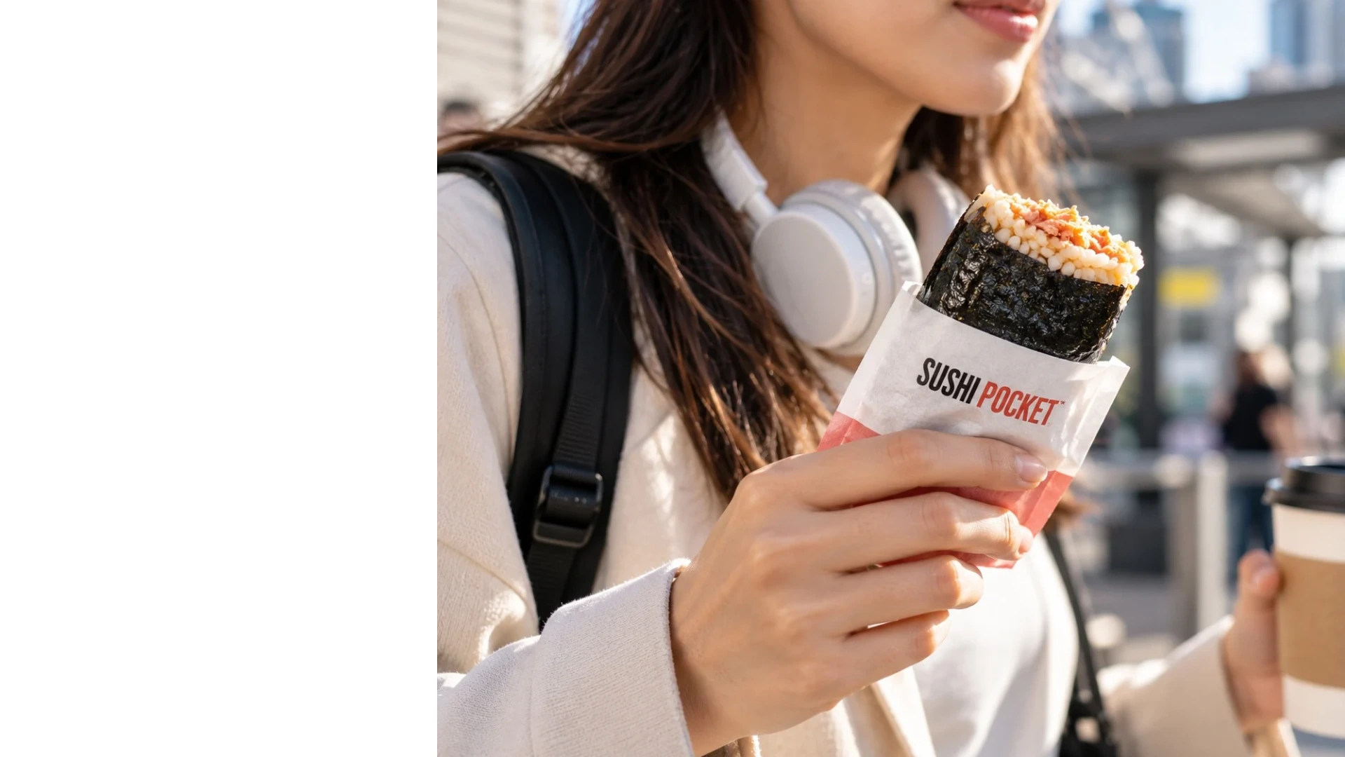 Sushi-inspired rice pocket filled with salmon and fresh ingredients, showing its handheld format